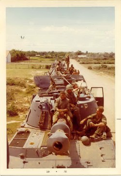 Three guns waiting outside of Cam Lo on their way down highway 9 to Vandergrift in the summer of 1970.